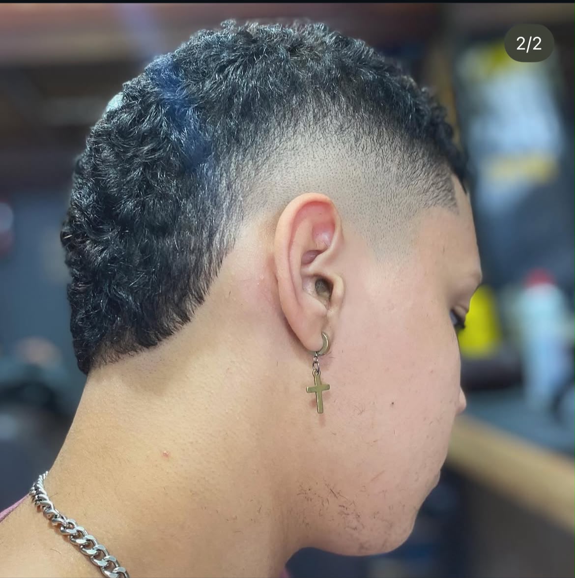 Moicano cacheado com degradê